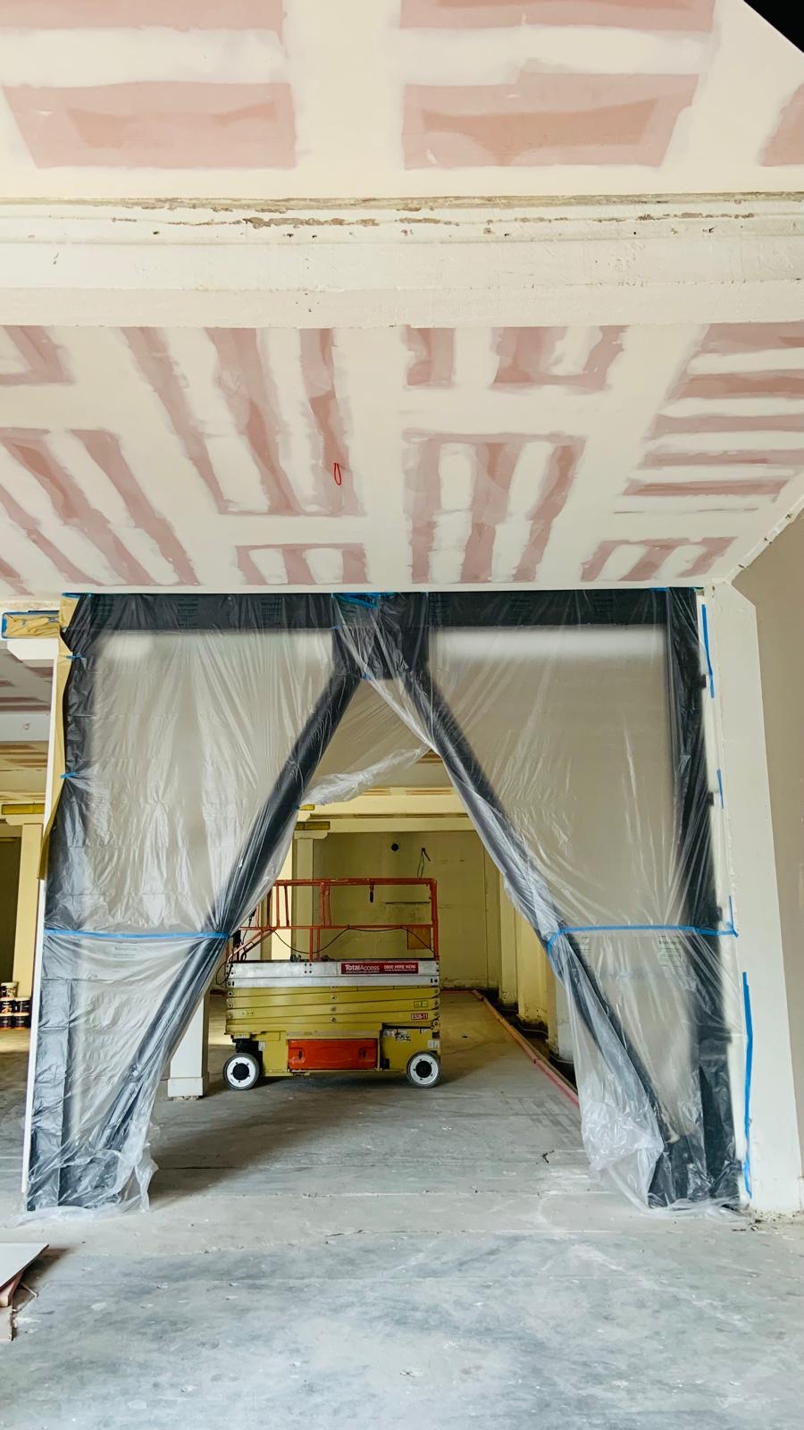 Commercial interior during ceiling GIB stopping and plastering preparation